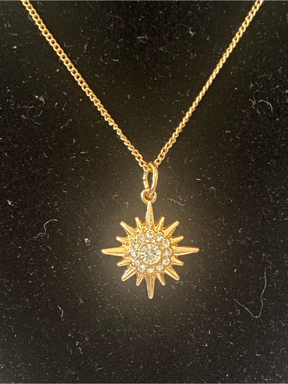 Gold Sunburst Pendant Necklace with Crystal Accent